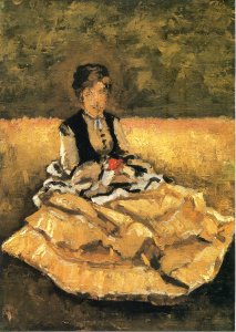 Woman Seated On The Grass